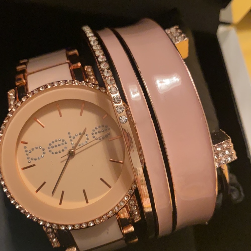 Rose gold and baby pink Bebe watch and bracelets